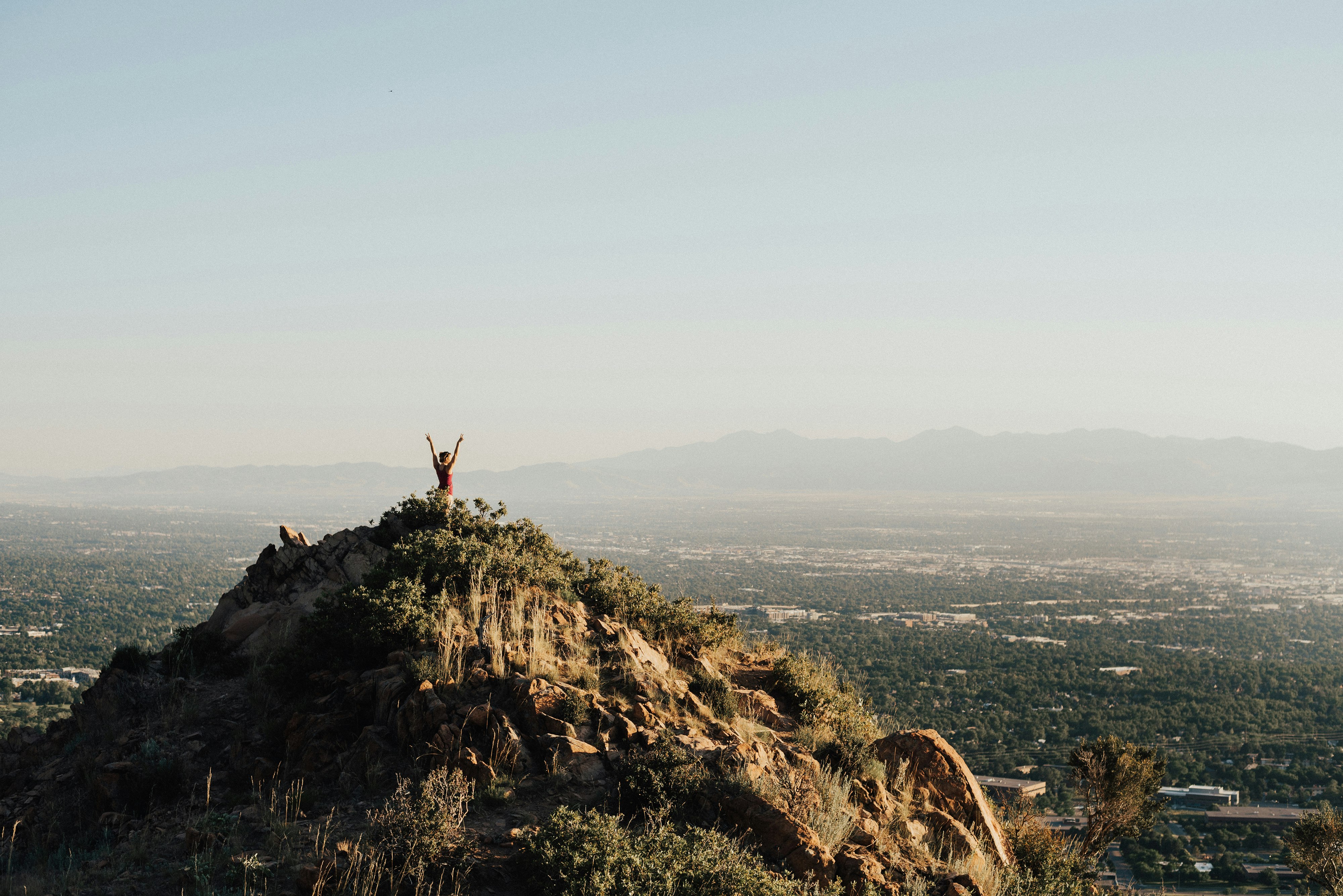 person on top mountain